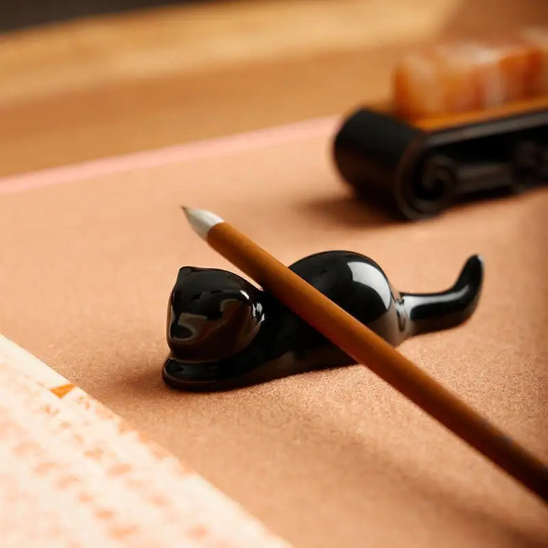 Handmade Porcelain Cat Brush Rest | Calligraphy Pen Holder - Desk Accessories by BrushPaper.com (view 1)