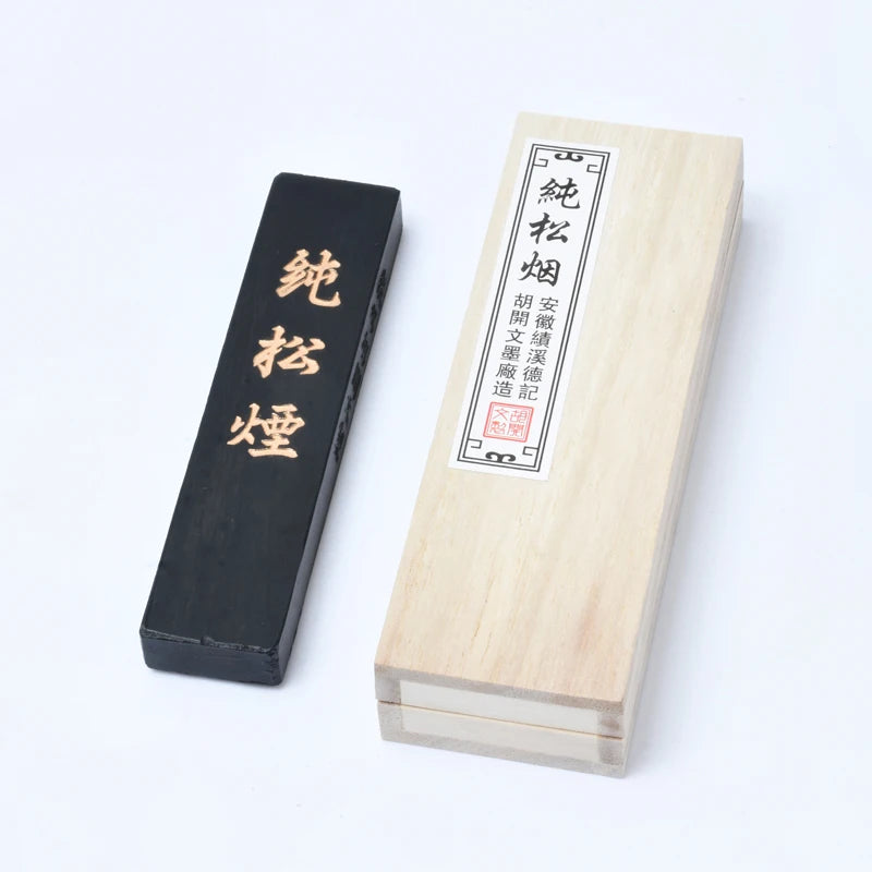 Close-up detail of handmade pine smoke ink block surface