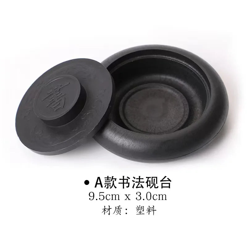 Tai Ji Yin Yang ink tray displayed in calligraphy desk setup