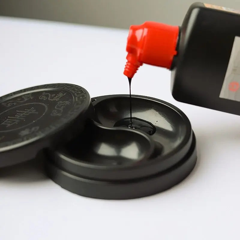 Tai Ji ink tray used with calligraphy brush for ink mixing